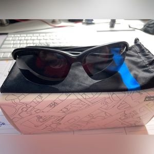 Oakley Unstoppable Thin Blue Line Edition with blue line carrying bag